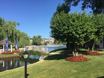 Two beautifully landscaped lakes with elegant fountains